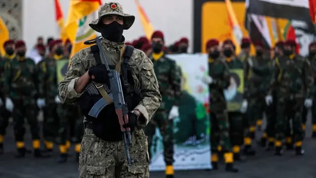 مدير إعلام الحشد: أسلحة الفصائل المسلحة لن تُسلّم إلى الحكومة العراقية